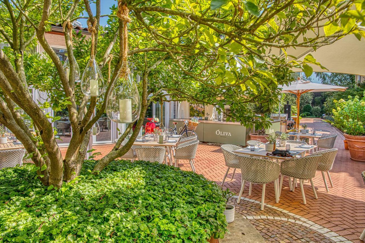 Vila Vita Rosenpark Marburg Luaran gambar The garden of the restaurant