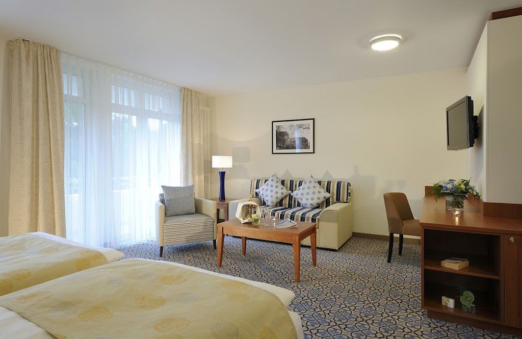 Vila Vita Rosenpark Marburg Luaran gambar A typical hotel room